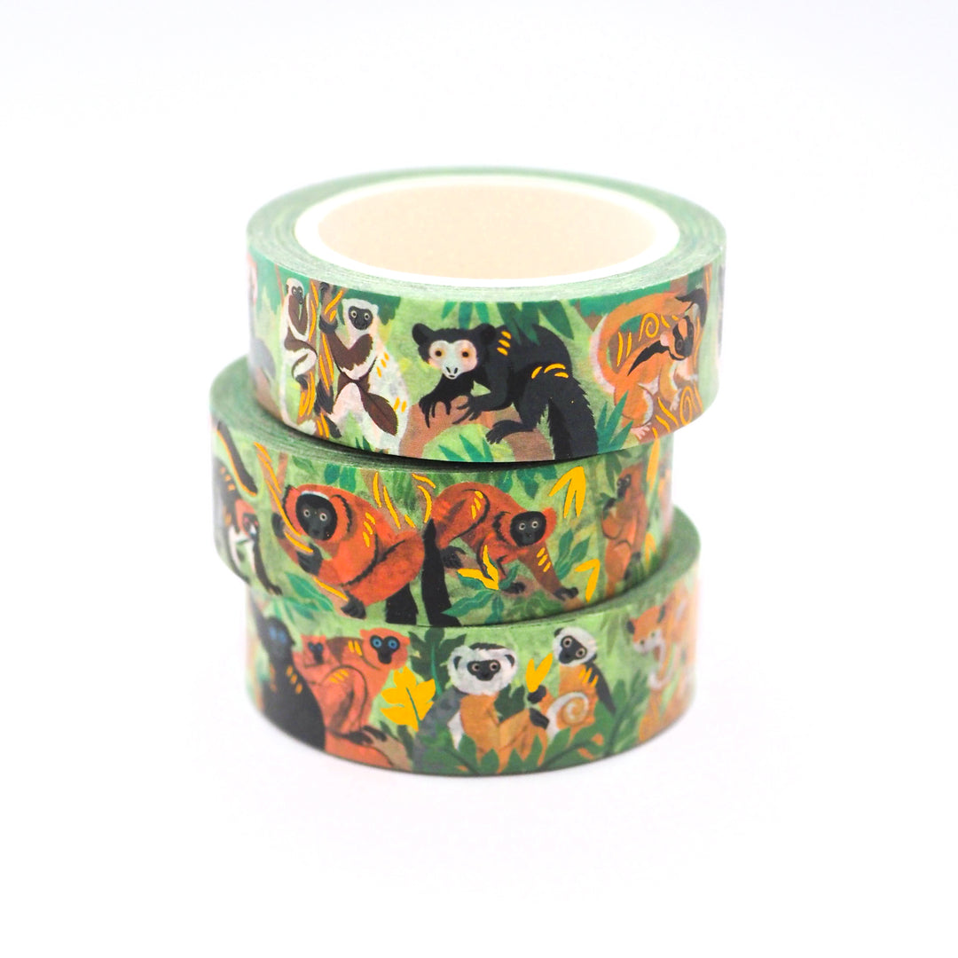Three rolls of washi tape with animal designs on a white background